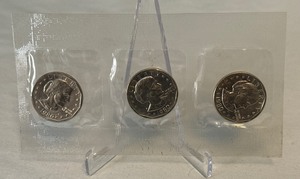 lot 97 image: 1980 PDS Susan B. Anthony 3 Coin Dollar Souvenir Set - cello wrapped