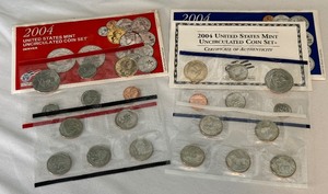 lot 138 image: P&D Two (2) 2004 US Mint Uncirculated Coin Sets (20 Coins) - original govt packaging (OGP) and envelope