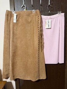 lot 18C image: Richard Malcolm, Howard Wolf ESCAPE Skirt Set - Tan Faux-Suede skirt wfringe & Pink Knit skirt (lot of 2)