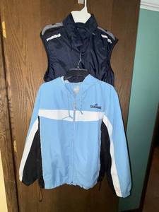 lot 401C image: Spalding Light Blue Windbreaker with White Stripe & DKNY Navy Vest