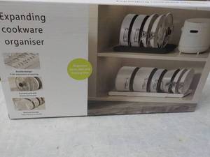 lot 57 image: Expanding Cookware Organizer...