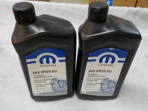 lot 132 image: 2 Mopar Automotive Transmission Flu...