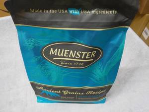 lot 139 image: 4 lb. Bag Muenster Dog Food...