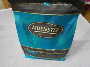 lot 140 image: 4 lb. Bag Muenster Dog Food...