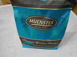 lot 141 image: 4 lb. Bag Muenster Dog Food...