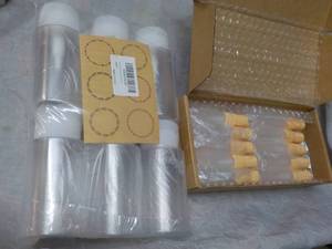 lot 239 image: 2 sizes Empty Storage Bottles...