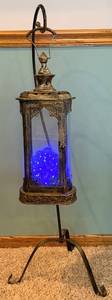 lot 26 image: Antique-Style Metal Lantern on Iron Stand & Blue LED Beads Bulbs Inside