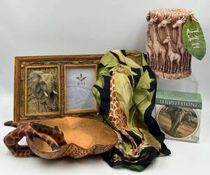 lot 39 image: Animal Spirits Safari Decor Set Elephant Relief Frame, Giraffe Pillar Candle, ECHO Silk Giraffe Jungle Scarf & Elephant Coasters