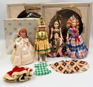lot 45 image: 4 Vintage Story Book Fashion Dolls Featuring Bridal Series Bride Doll and Doll Clothes