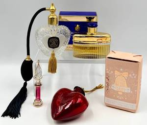 lot 53 image: Victorias Secret Eau De Cologne Spray 1.7 oz NIB and Perfume Spray Bottle& Castelbel Vanilla Spice Soap, Heart Ornament and Small Glass Perfume Bottle