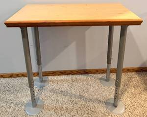 lot 98 image: Adjustable Height Crafting Table with Light Wood Top & Four Gray Metal Legs