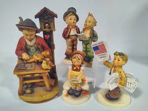 lot 40 image: Goebel M.I. Hummel Figurines