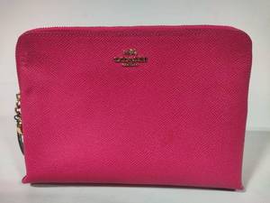 lot 76 image: Coach WristletMakeup Bag