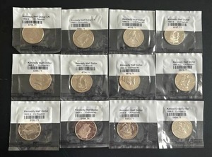 lot 28 image: Twelve (12) Sealed Kennedy Half Dollar Proofs - 1990s and 2000s
