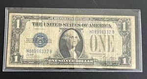 lot 40 image: 1928A $1 Blue Seal Silver Certificate Funny Back (Very Good)