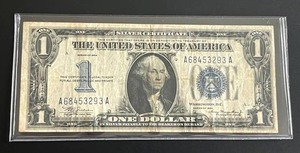 lot 42 image: 1934 $1 Blue Seal Silver Certificate Funnyback (Fine)