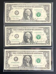 lot 49 image: Uncirculated $1 Federal Reserve Star Notes - 1999  2003  2006