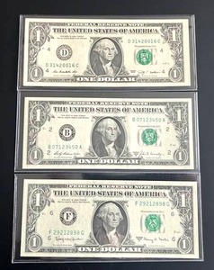 lot 53 image: Uncirculated $1 Federal Reserve Notes - 1963A  1969B  2009
