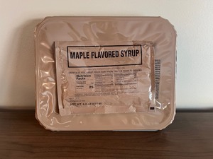 lot 1 image: US Military Platoon Sized Breakfast Cake with Maple Syrup