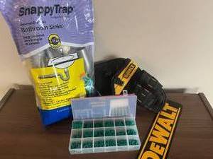 lot 36 image: Lot of Plumbing Parts, Dewalt Items