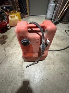 lot 42 image: Boat gas tank and hose