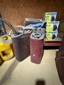 lot 41 image: 2 metal military style gas cans