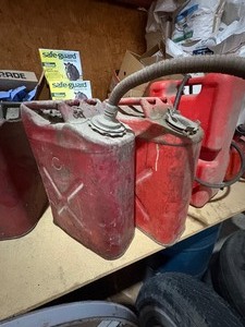 lot 40 image: 2 metal military style gas cans