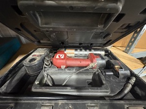 lot 64 image: Alemite Cordless Grease Gun