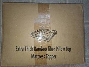 lot 68 image: Queen bamboo pillow top mattress topper