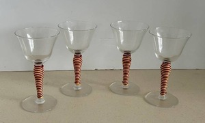 lot 9 image: MCM Champagne Coupes - Clear Glass with Red & White Striped Spiral Rattan Wrapped Stems - Set of 4