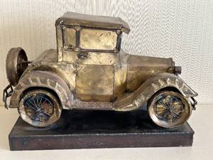 lot 29 image: Large Antique-Style Metal Car Sculpture on Steel Welded Base