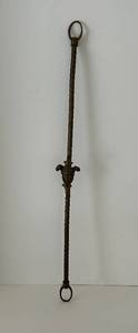 lot 45 image: Neoclassical Wrought Iron Hanging Rod - Ring Tops & Central Face Themed