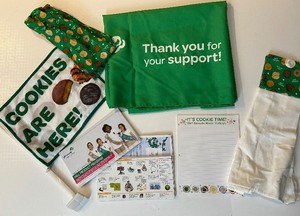 lot 282 image: Girl Scouts River Valleys Cookie Promo Gear & Materials - Tablecloth, Flag,  & Brochures Items