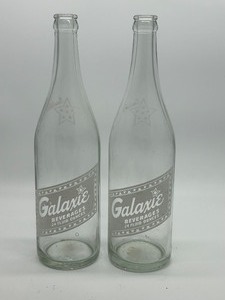 lot 342 image: Galaxie Beverages Glass Bottles 24 Fluid Ounces (Lot of 2)
