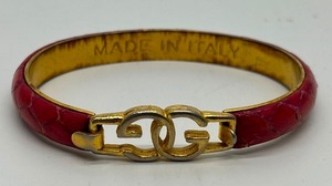 lot 385 image: Vintage GG GUCCI Red Crocodile-Texture Leather Bracelet - Gold Interlocking Loop Clasp - Made in Italy
