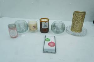 lot 36 image: Battery Operated Pillar Candles, new Candles, and candle holders