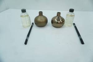 lot 38 image: Pottery Barn Diffuser Oils, jars, and sticks