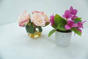 lot 39 image: 2ct Artificial Flower Arrangements wvase & planter