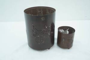 lot 114 image: Metal (with glass inserts) Pinecone Candle Holders