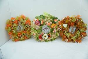 lot 162 image: Fabric Mesh Wreaths. 2 Fall Themed, 1 Mothers Day Themed. NEW
