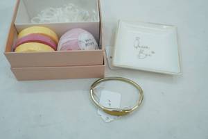 lot 253 image: Gold Tone Monet Cuff Bracelet, Bath Bomb, Shower Steamers, and Gold Accented Queen Bee Soap Plate, Gift Box