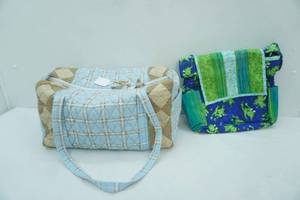 lot 281 image: 2 quilted diaper bags.