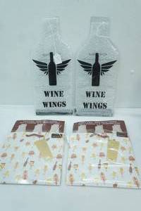 lot 295 image: NEW Wine Wings-Wine Bags for travel or gifting 6-pack papyrus gift bags wbottle openers