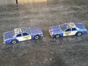 lot 28 image: 2 1977 Hot Wheels Sheriff Cars