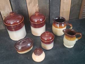 lot 31 image: 7 Various beautiful Mid Modern Stoneware Kitchen Canisters Pitchers and more