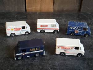 lot 38 image: 5 Vintage Hot Wheels 1976 Swat Van and Wonder Bread Van and 3 1986 Vans