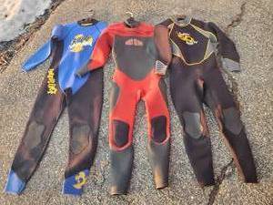 lot 55 image: 3 Quality Wet Suits Sterns and Body Glove Large and XL Sizes