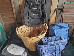 lot 63 image: Large Group of Ottertail Co. Bags including Backpack, Roller Bag, and woven Basket