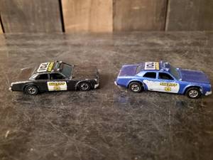 lot 95 image: 2 Vintage 1977 Hot Wheels Sheriff Cars