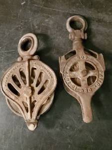 lot 96 image: 2 Cast Unique Barn Pulleys&nbsp
